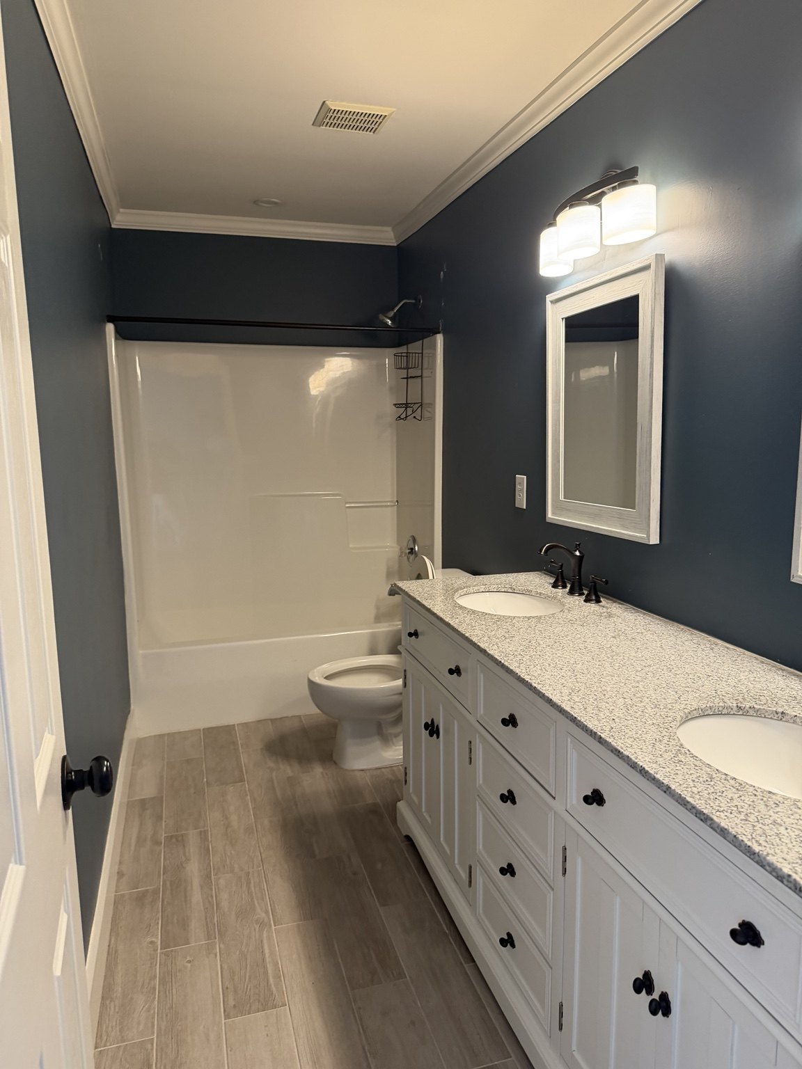 Clean Queen NC cleaning work - modern bathroom vanity and shower
